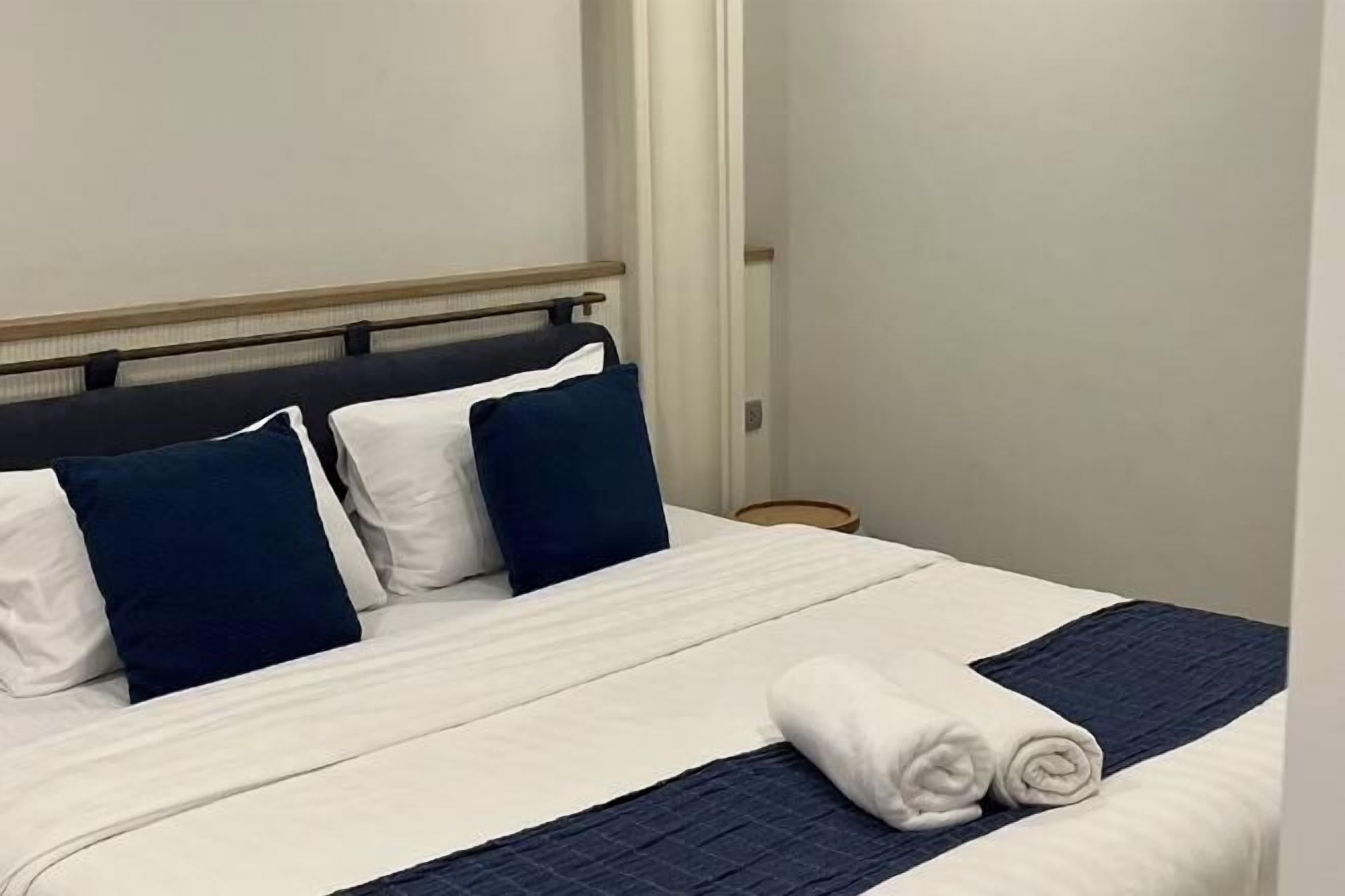 Individually decorated, desk, blackout curtains, iron/ironing board