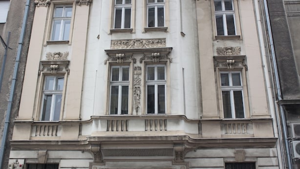 A building with ornate architectural details, including decorative moldings and multiple windows. - New Generation Hostel Belgrade Center (Belgrade)