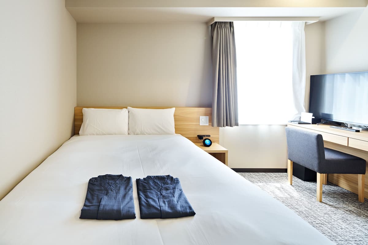 In-room safe, desk, blackout curtains, iron/ironing board (on request)