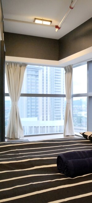 Dusk Till Dawn - Duplex Condominium | Hochwertige Bettwaren, Daunenbettdecken, individuell dekoriert