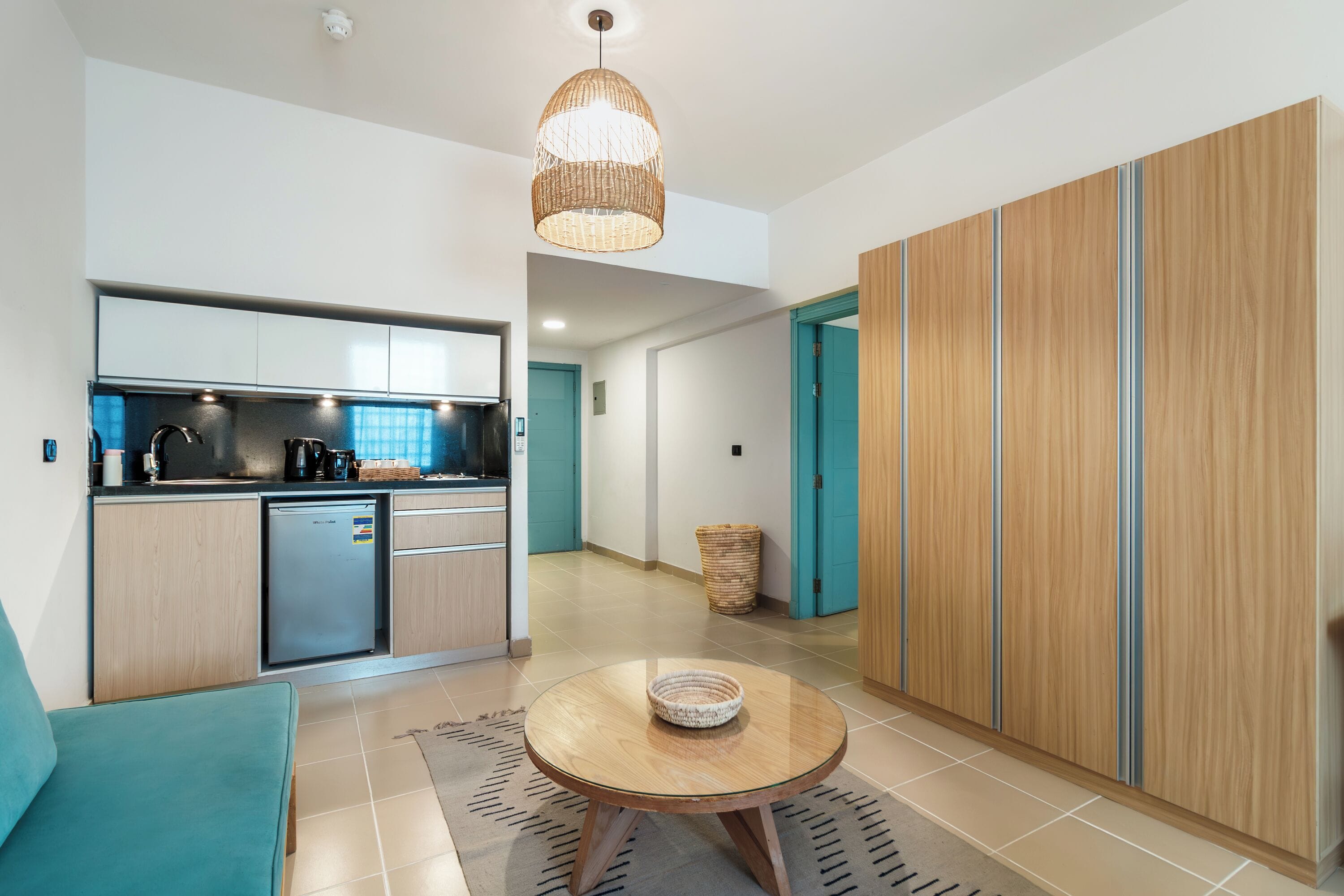 one bedroom apartment back view | living area | smart tv, fireplace