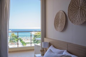 Family Suite Sea View | Draps en coton égyptien, literie de qualité supérieure, minibar