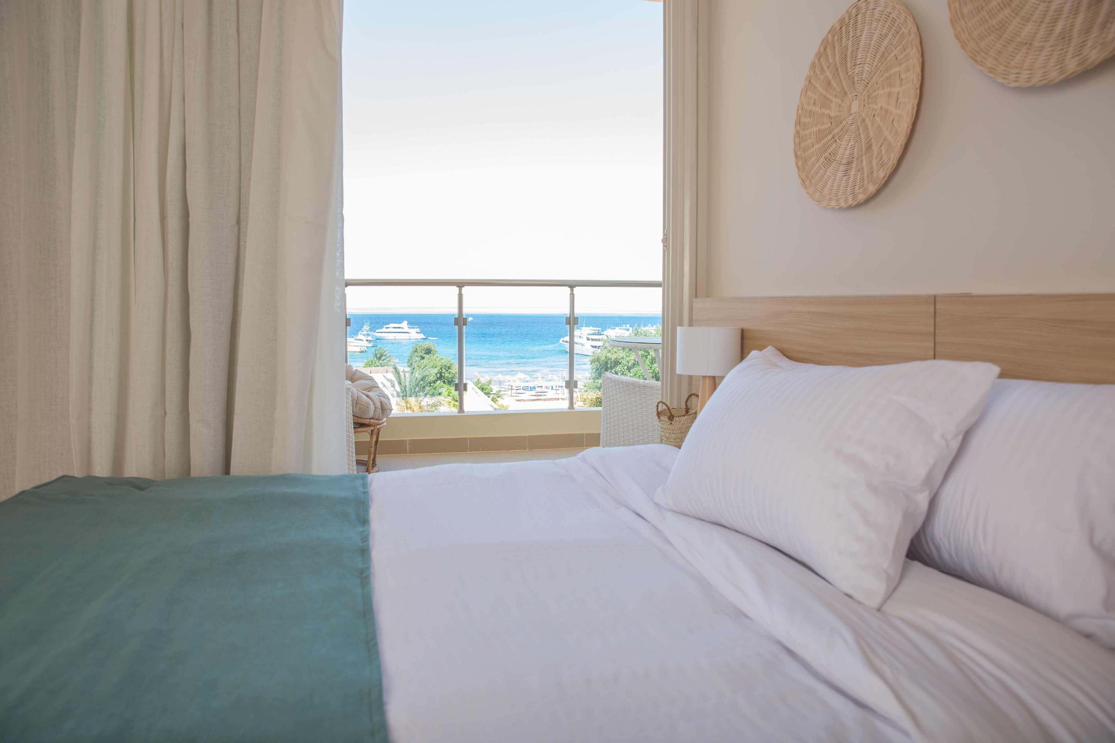 Family Suite Sea View | Draps en coton égyptien, literie de qualité supérieure, minibar