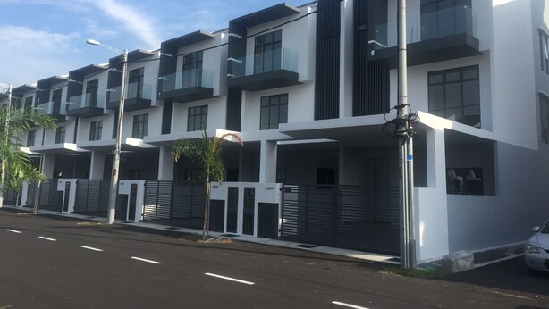 A modern multi-story residential building with balconies, a gated entrance, and a clear sky. - Kota Laksamana Comfortable Crowd by Step-In (Malacca City)