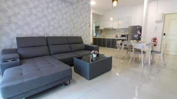 Apartment, 1 Bedroom | Living area | TV
