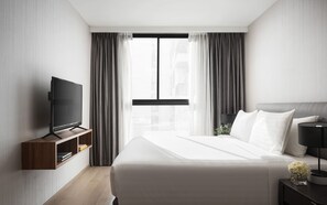 Habitación Deluxe, 1 habitación | Ropa de cama de alta calidad, minibar, caja fuerte y escritorio