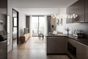 Ropa de cama de alta calidad, minibar, caja fuerte y escritorio