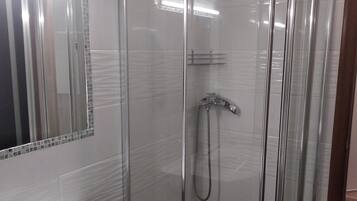 Shower, free toiletries, hair dryer, bathrobes