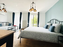 Superior Quadruple Room, 1 Bedroom, Garden View | Individually decorated, individually furnished, blackout drapes