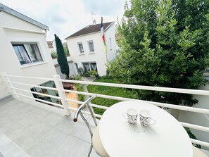 Habitació quàdruple superior, 1 dormitori, vistes al jardí | Terrassa o pati