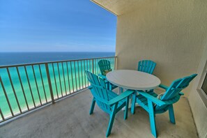 Outdoor dining - Calming Beachfront Condo with Oversized Balcony Facing the Gulf - Unit 2101 by RedAwning (Panama City Beach)