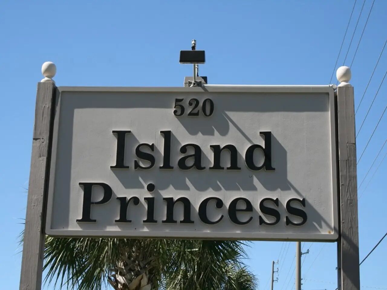 A sign for 'Island Princess' with the number 520.