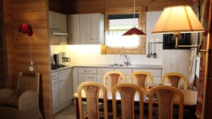 House | Private kitchen | Coffee/tea maker, fridge, microwave, highchair - Finnish, Wooden Bungalow with Microwave near Forest (Markelo)