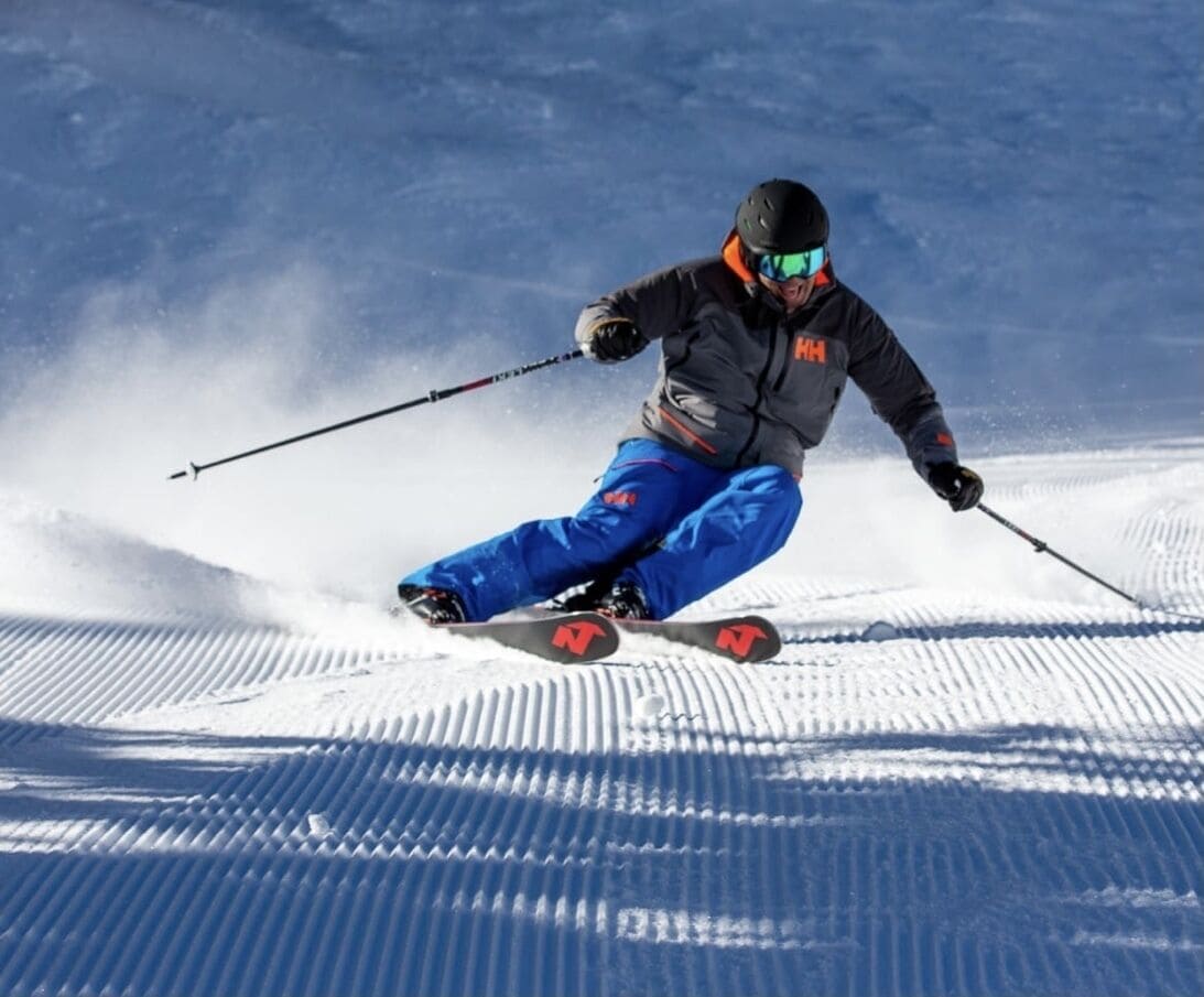 A person skiing on a snowy slope.