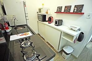Apartment | Private kitchen | Fridge, microwave, stovetop, cookware/dishes/utensils