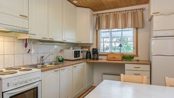 Fridge, microwave, cookware/dishes/utensils