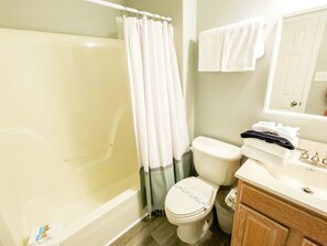 Combined shower/bathtub, hair dryer, towels - Budget Friendly 3 BR~Beach Access Nearby (Gulf Shores)