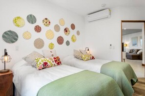 2 bedrooms, desk, blackout curtains, iron/ironing board