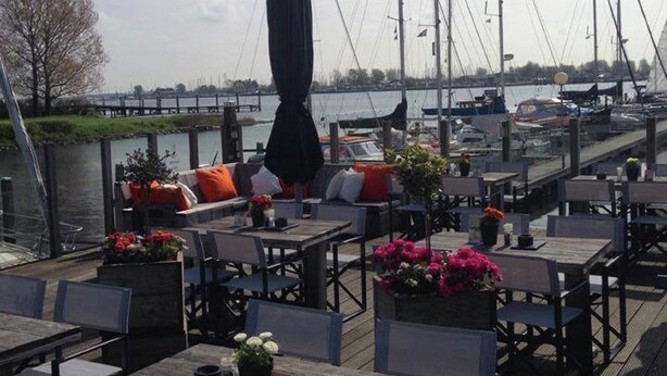 Villa | Balcony - Comfortable Villa With a Dishwasher, at the Veerse Meer (Kortgene)
