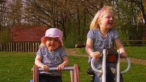 Two children playing on a playground equipment in a park. - House With Bubble Bath, at 20 km. From Assen (Westerbork)