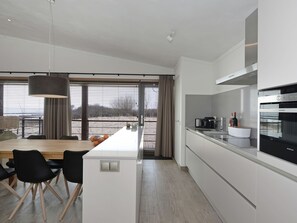 Villa | Private kitchen | Fridge, microwave, dishwasher