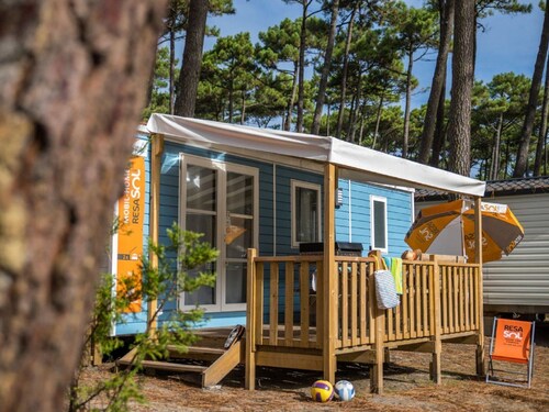Cozy Mobile Home With Covered Terrace on a Luxury Campsite