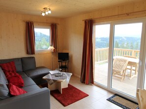 Chalet | Living room | Fireplace - Luxurious Chalet in Wolfsberg With Sauna (Bad Sankt Leonhard im Lavanttal)