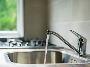 Casa | Cocina privada | Microondas y cafetera y tetera