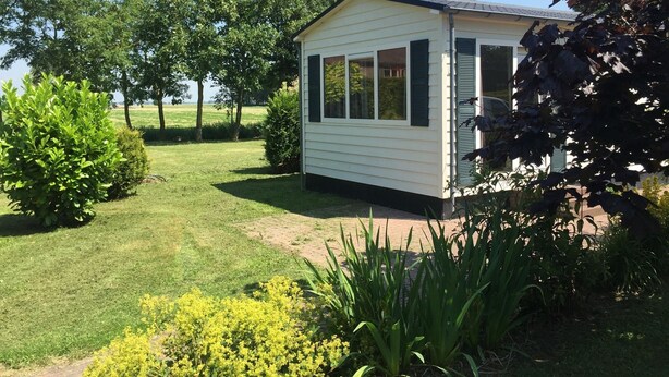 Chalet | Exterior - Detached Chalet with Microwave near Wadden Sea (Tzummarum)