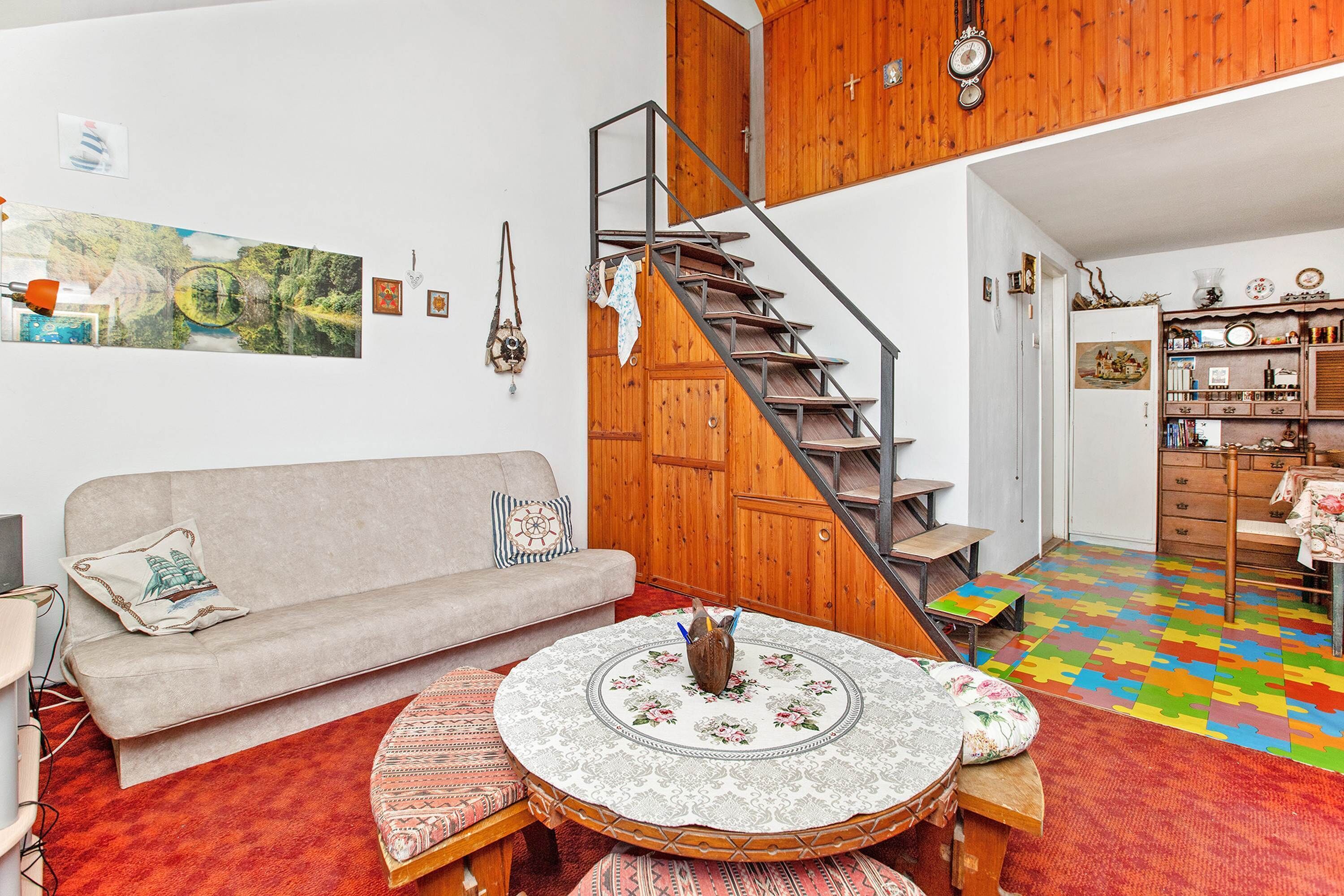 Comfort House | Living area | 32-inch TV with cable channels