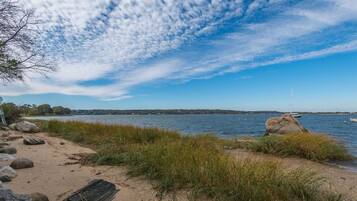 On the beach, sun loungers, beach towels