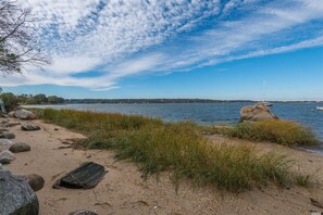 On the beach, sun-loungers, beach towels