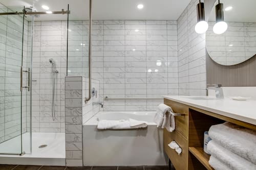 Standard Room, 2 Queen Beds | Bathroom | Shower, rainfall showerhead, free toiletries, hair dryer
