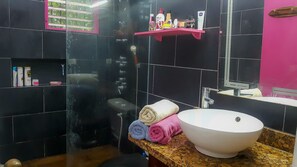 Shower, hair dryer, towels, soap