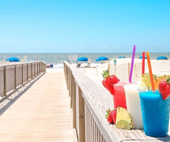 On the beach, sun-loungers