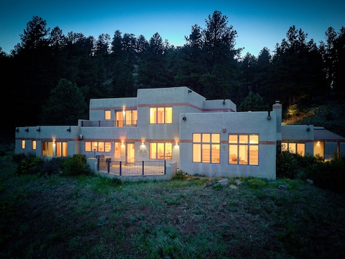 Amazing mountain home on 126 acres bordering national forest land