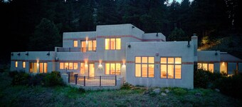 Amazing mountain home on 126 acres bordering national forest land