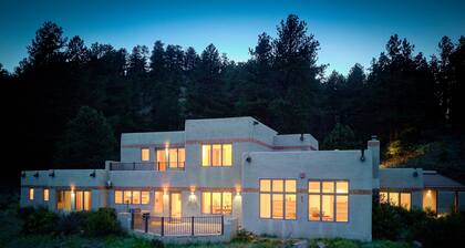 Amazing mountain home on 126 acres bordering national forest land