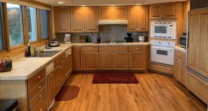 Amazing mountain home on 126 acres bordering national forest land