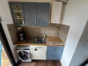 Fridge, microwave, cookware/dishes/utensils
