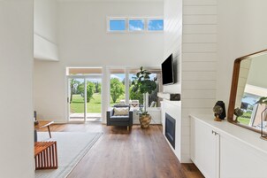 Premier Condo, 4 Bedrooms (111 Wintergreen - Pet Friendly) | Living area | Flat-screen TV