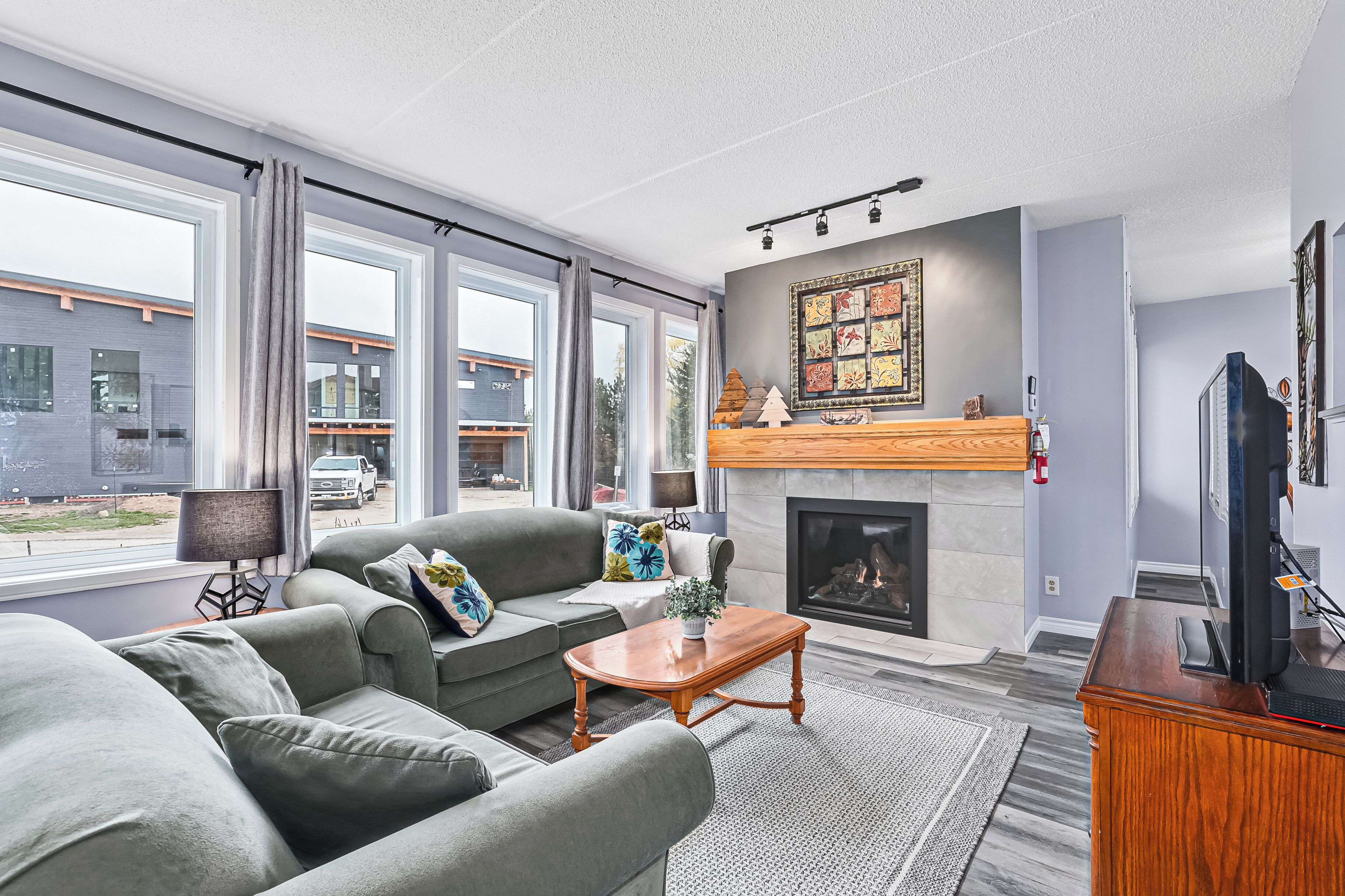 Deluxe Chalet, 2 Bedrooms (101 Cachet Crossing - No Pets Allowed) | Living area | 50-inch LED TV with digital channels, TV