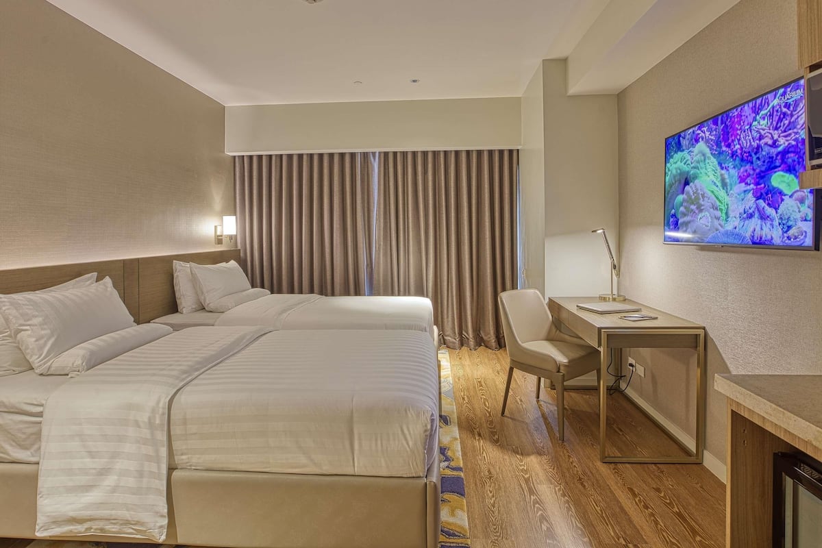 Habitación estándar con 2 camas individuales, 2 camas individuales, vista a la ciudad | Ropa de cama hipoalergénica y caja de seguridad en la habitación