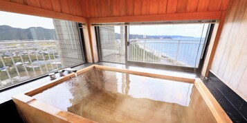 Separate tub and shower, free toiletries, hair dryer, slippers