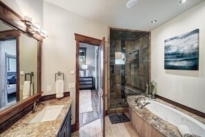 Bathtub, jetted tub, hair dryer, towels
