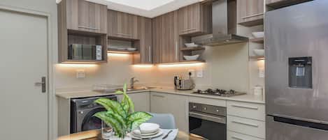 Appartement Deluxe, 2 grands lits | Cuisine privée | Grand réfrigérateur