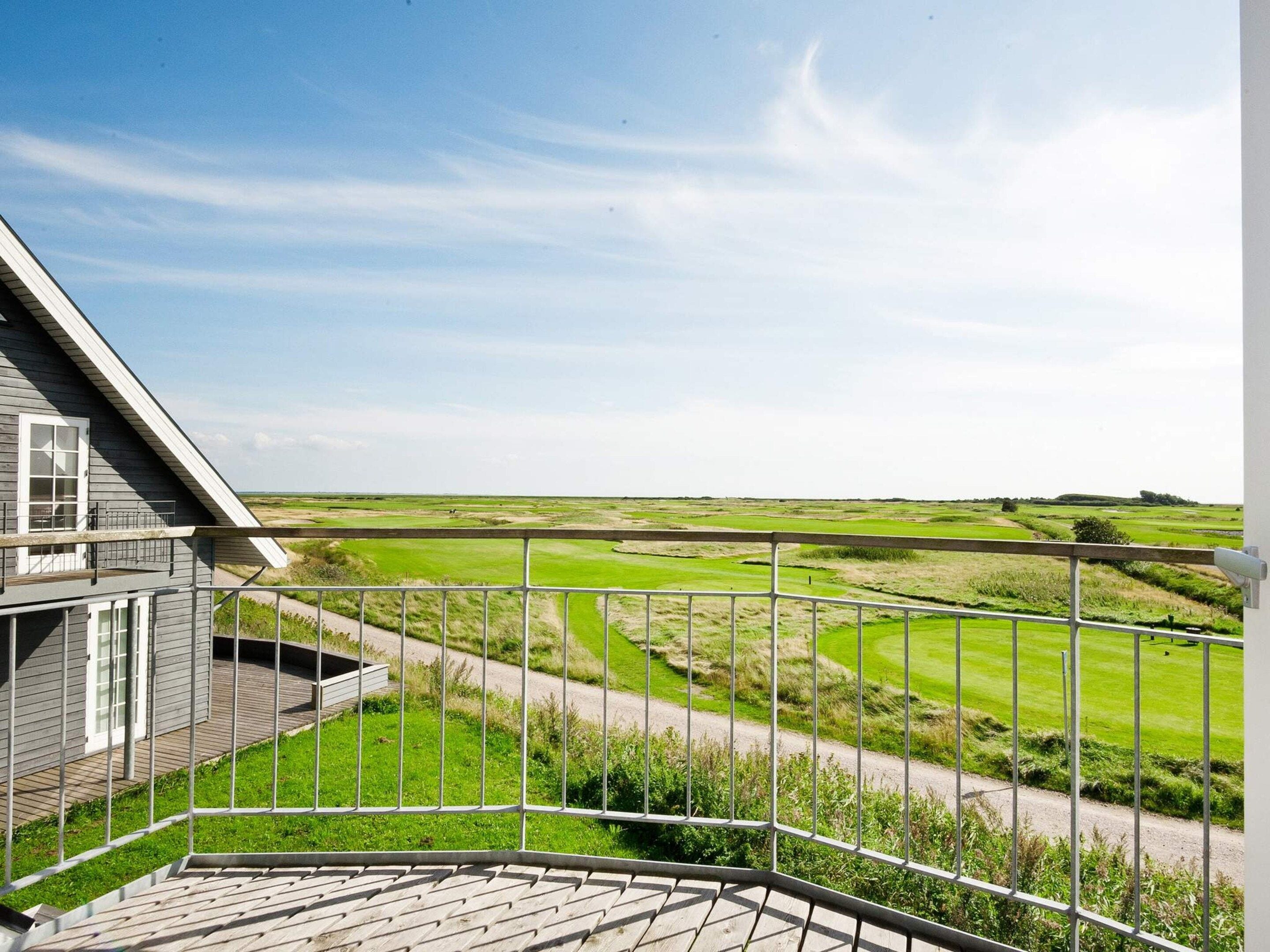 A residential property with a view of a golf course.