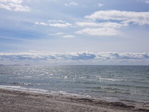 A beach with a clear sky and calm sea. - 4 Star Holiday Home in Karrebaeksminde (Karrebæksminde)