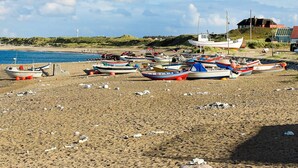 Casa | Praia | Prática de pesca 