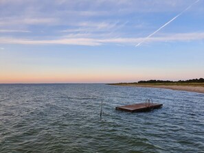 A wooden pier extending into calm waters with a clear sky above. - 12 Person Holiday Home in Nordborg (Nordborg)